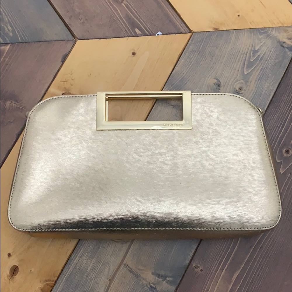 Metallic gold Michael Kors clutch optional strap